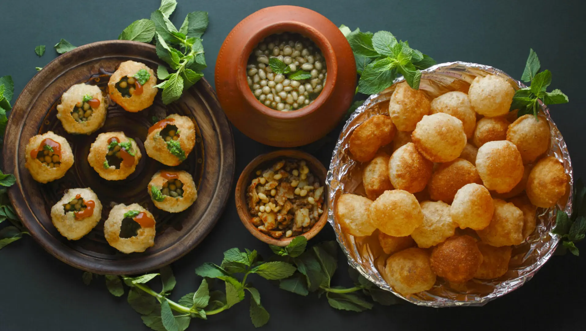 A table with different types of food on it.