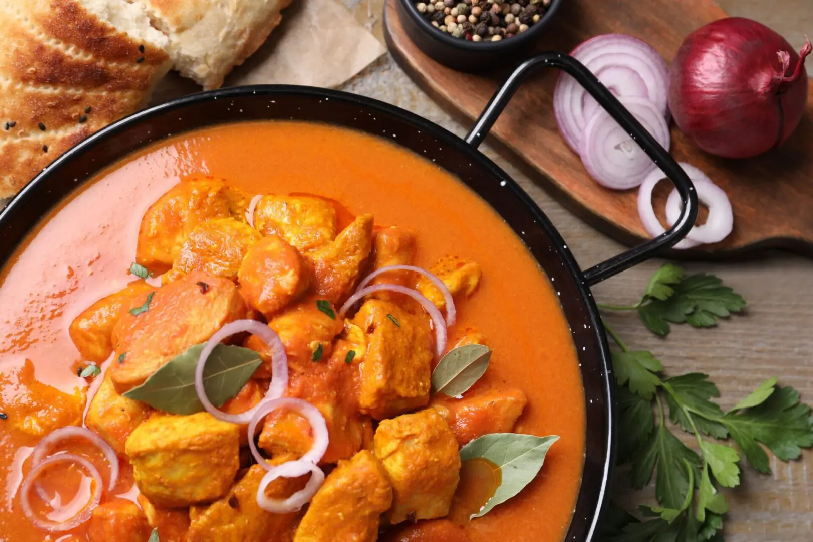 A bowl of food on top of a table.