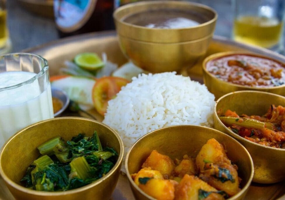 A plate of food with rice and vegetables.